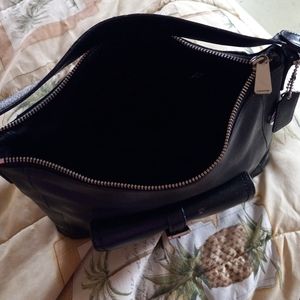 Authentic coach purse. Black leather ; like brand new. Medium size.